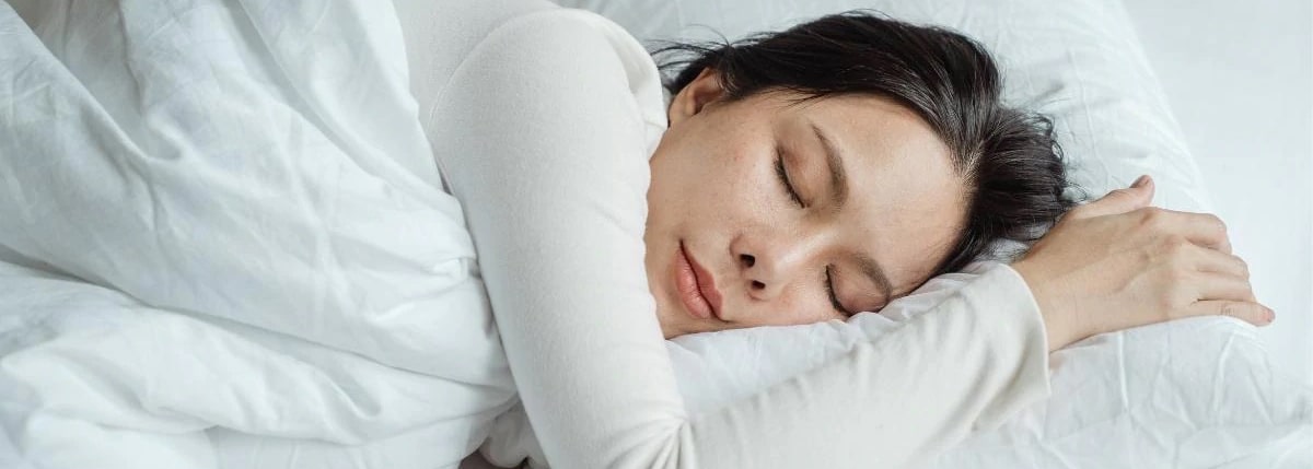Image of Woman Sleeping in Chelated Magnesium for Sleep Article